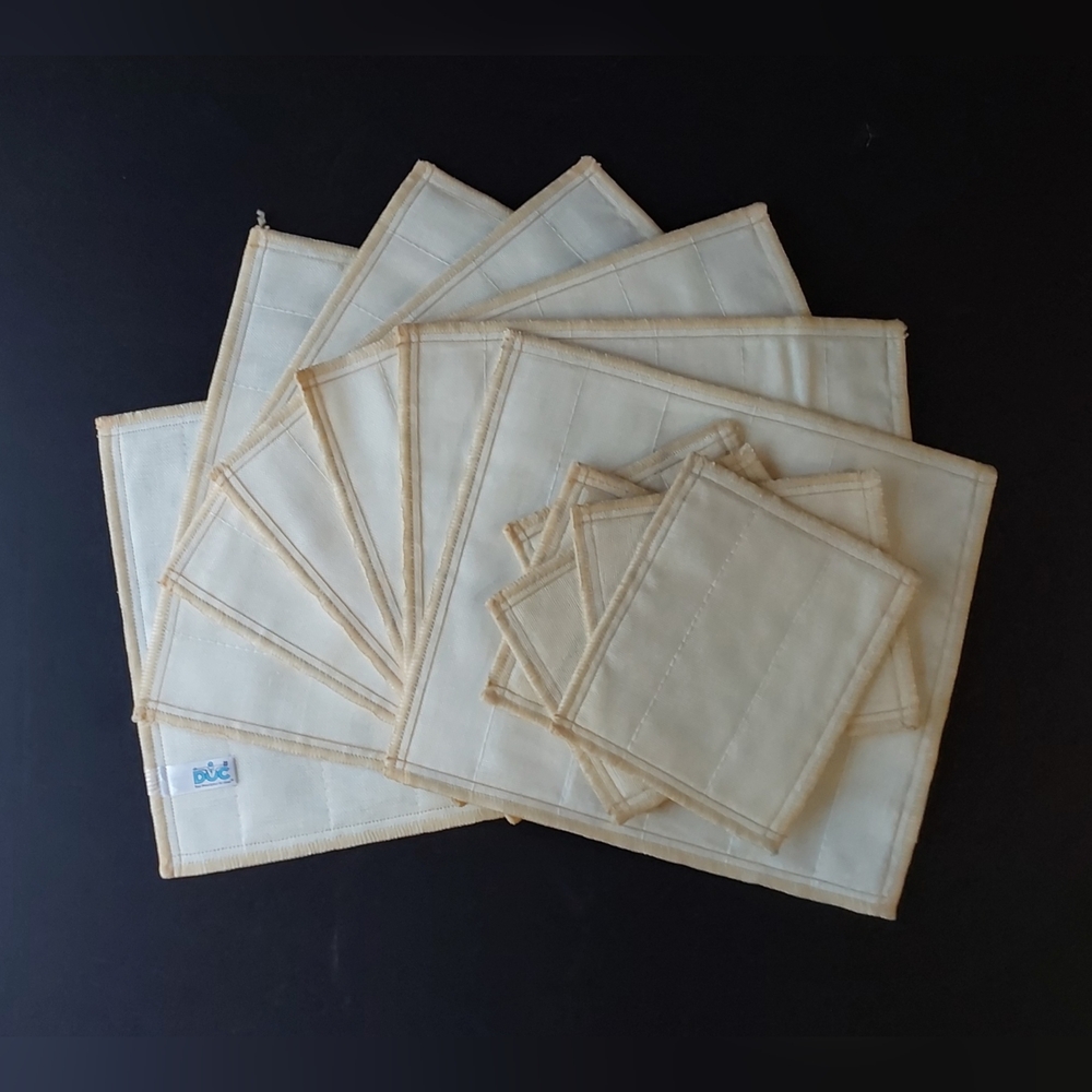 NEW (5) DUC Beige/White Placemats and Coasters Set
